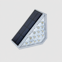 Triangular staircase lamp